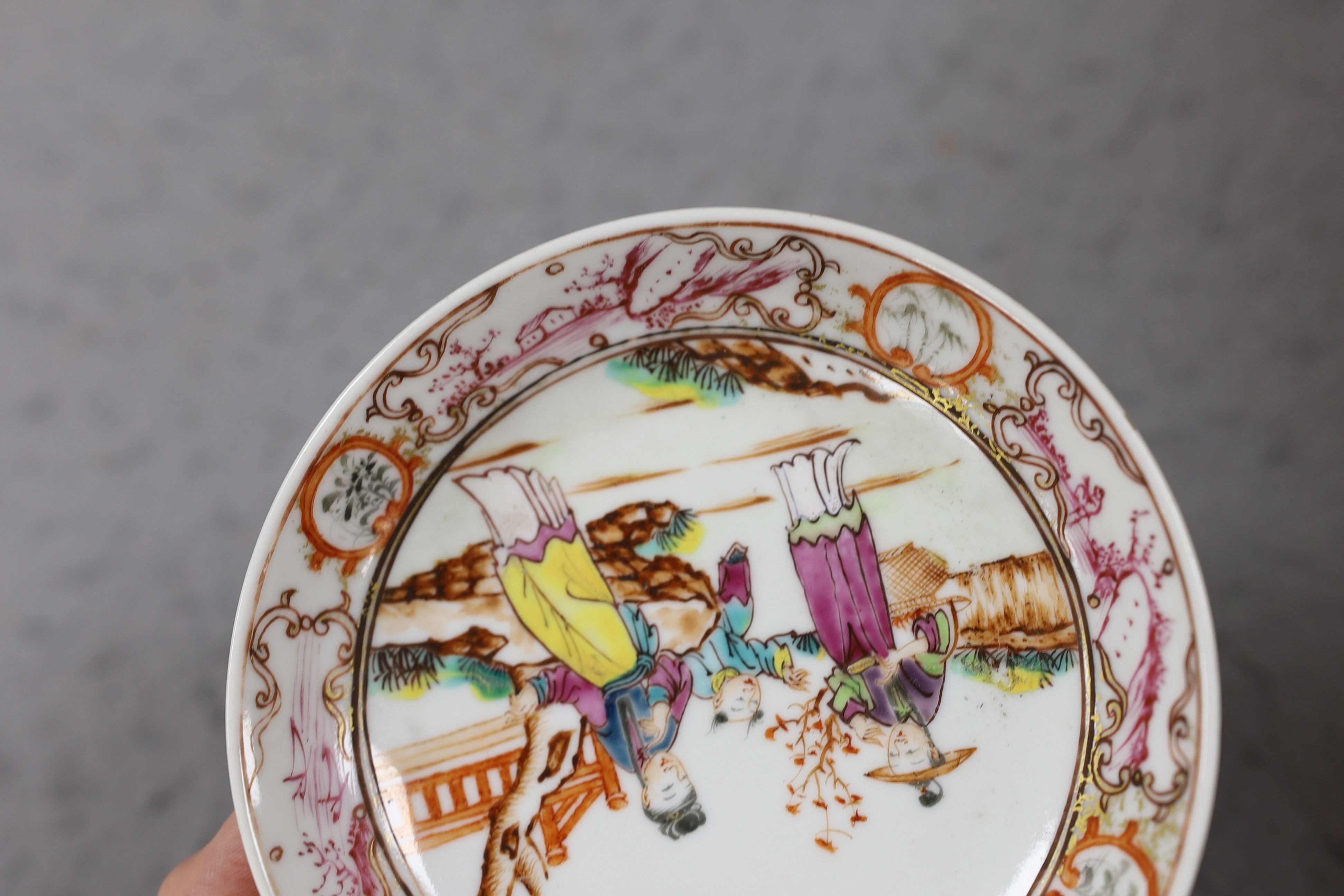 A group of four 18th century Chinese export famille rose saucers
